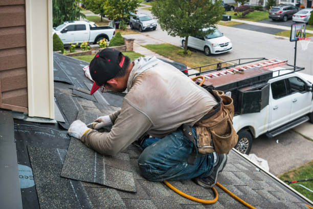 Professional Roofing technician working in Cascade, WI